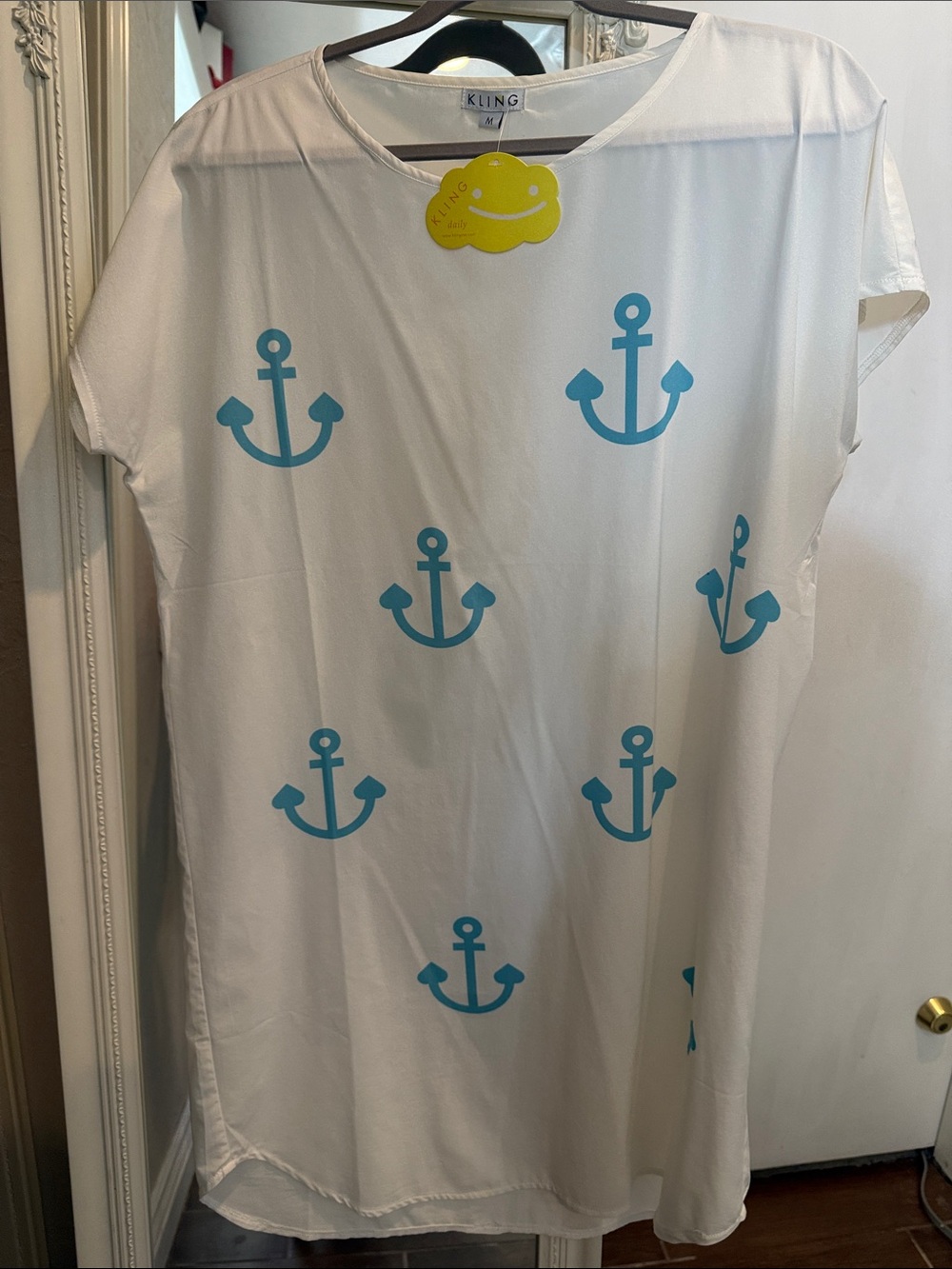Lightweight Anchor dress perfect for swimsuit coverup. Size Large.New never worn